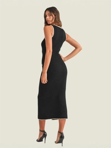 Slim fit black knitted midi dress with white contrast trim and sleek open back design