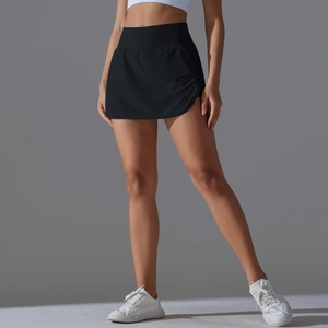 Detail of high waisted black tennis skirt with side drawstring and breathable fabric