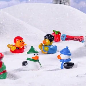 Set of 4 Christmas miniature sports yellow duck figurines for festive desktop decor