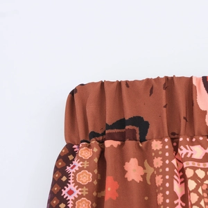 Women's boho vacation set featuring elastic waist trousers with ethnic geometric patterns