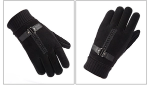 Detail of pigskin leather motorcycle gloves with knit cuffs and decorative metal buckle strap