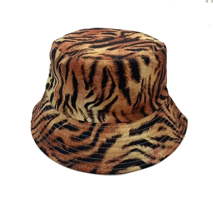 Outdoor bucket hat with yellow and black tiger stripe pattern and reinforced stitching