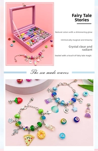 Detail of DIY jewelry kit with colorful beads, pendants and pink velvet storage box