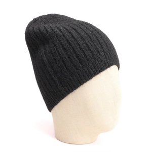 Close-up of black ribbed knit wool blend beanie with thick texture and elastic weave