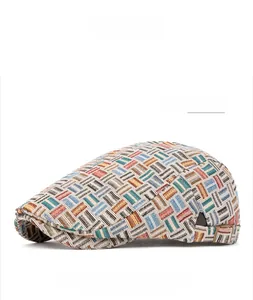 Detail of vintage plaid newsboy cap with colorful knit texture and metal side buckle