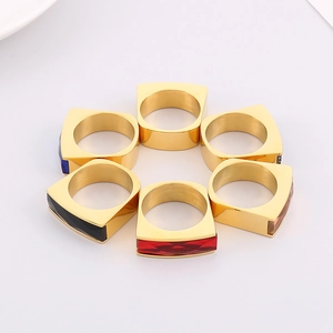 Set of six gold stainless steel rings with colorful rectangular luxury glass gemstones