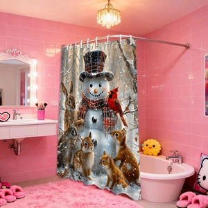 Detail of Christmas shower curtain with snowman and animals in a pink modern bathroom