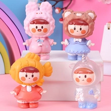 Set of four cute cartoon girl figurines in animal costumes for creative home decoration