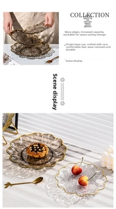 Detail of glacier texture glass dessert plates with gold rims and stackable design