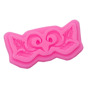 Pink silicone mold with ornate European lace and scroll patterns for DIY baking