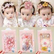 Three-piece pink baby floral headband set in a decorative gift box for infants
