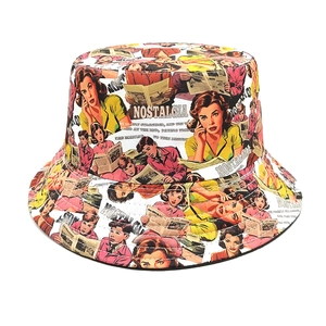 Detail of vintage pop art character print on bucket hat with Nostalgia lettering