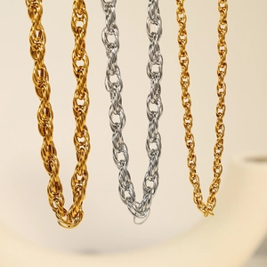 Fashionable gold and silver metal chain necklaces in various link styles and sizes
