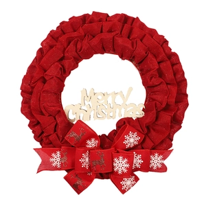 Red fabric Christmas wreath with Merry Christmas wooden sign and golden reindeer bow