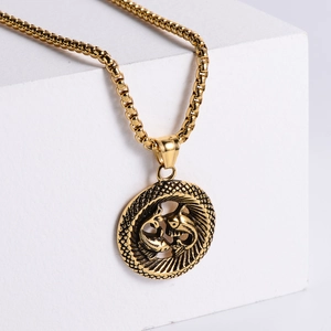 18K gold plated stainless steel Pisces zodiac pendant necklace on white geometric blocks