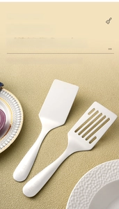 Detail of 304 stainless steel spatula set with SUS 304 stamp on matte metal handle