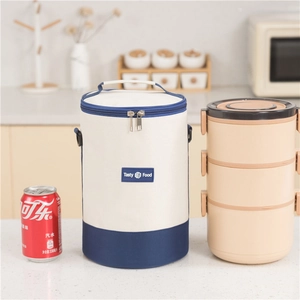 Insulated cylindrical lunch bag with shoulder strap and three-layer bento box set