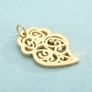 Golden stainless steel hollow leaf pendant with elegant polished finish for DIY jewelry
