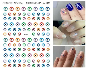 Macro shot showing multi-color Evil Eye nail stickers with 80x103mm dimensions