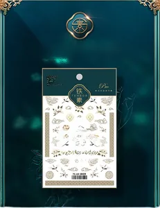 Detailed 5D nail art sticker featuring crane and magnolia in traditional Chinese style
