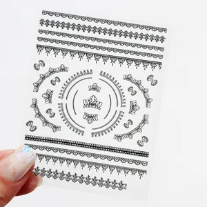5D embossed black lace nail art stickers with circular crown patterns and 3D floral textures