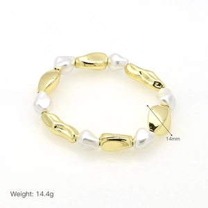 Detailed view of 14mm irregular white pearls and 18k gold plated beads on the bracelet