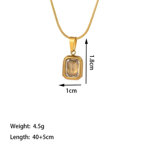 Detail of 18k gold rectangular zircon pendant with dimensions and snake chain specs