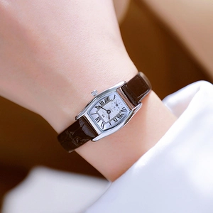Women's quartz watch with silver tonneau case, Roman numerals and brown leather strap