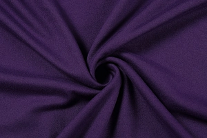 Close-up of soft purple knitted fabric texture showing premium modal blend material