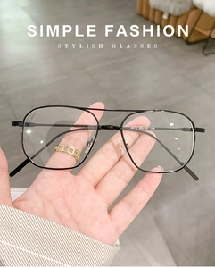 Close-up of black metal square frames with stylish double bridge and lightweight design