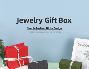 Detail of luxury textured jewelry boxes with Just For You ribbon bow and elegant finish