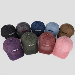 Nine colors of washed cotton baseball caps featuring vintage Conquer letter embroidery