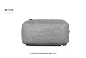 Detail view of the durable dark grey fabric and reinforced base on this laptop backpack