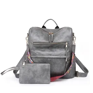 Retro grey PU leather backpack set for women with colorful woven straps on white background
