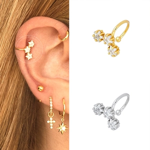 18k gold plated star ear cuff with sparkling zircons shown on model and product view