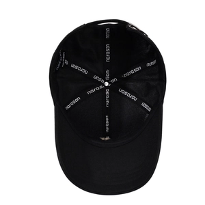 Black cotton baseball cap showing interior branded seams and high-quality construction