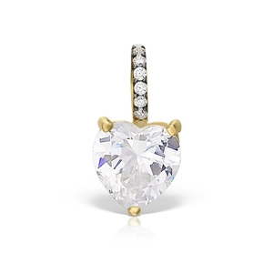Close-up of a heart-shaped gold pendant with cubic zirconia inlay on a white background