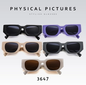 Flat lay of retro aviator sunglasses in five colors including black and beige
