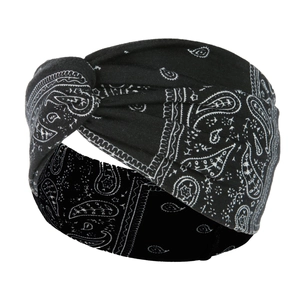 Detail view of black paisley cotton yoga headband with a stylish twisted knot design