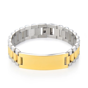 Macro detail of two-tone stainless steel link bracelet with blank engraving plate