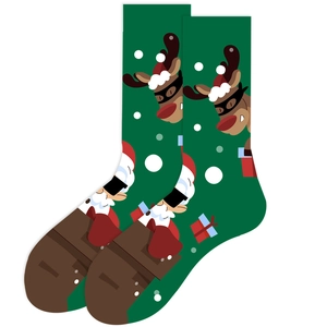 Detail of forest green Christmas crew socks with Santa and reindeer knitted patterns