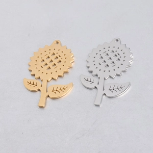 Detailed view of gold and silver sunflower pendants with hollow centers for DIY jewelry
