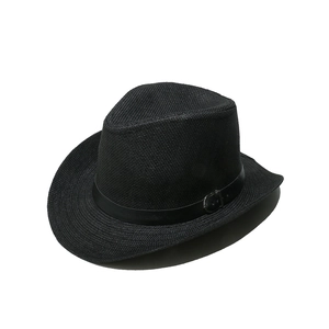 Detail of black straw fedora showing fine weave texture and leather band with silver buckle
