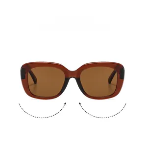 Detail of amber brown square sunglasses with jelly-colored frames and tinted lenses