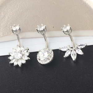 Three-piece silver steel belly button ring set with sparkling zirconia floral designs