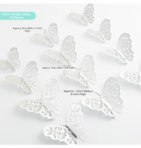 Detailed silver 3D hollow butterfly wall stickers in three sizes on white background