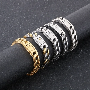 Detail of 11mm Cuban link bracelets in gold and silver finish with vintage textures