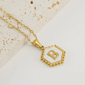Golden hexagonal pendant necklace with letter B and white shell inlay for women