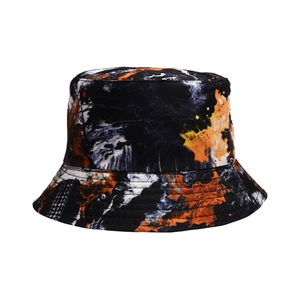 Detail shot of tie-dye bucket hat with abstract orange and black canvas pattern