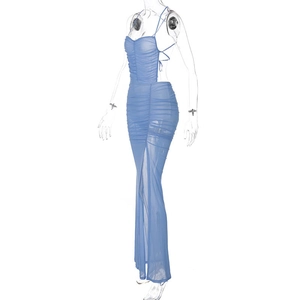 Detailed view of backless blue tulle dress with ruching and high slit on a mannequin